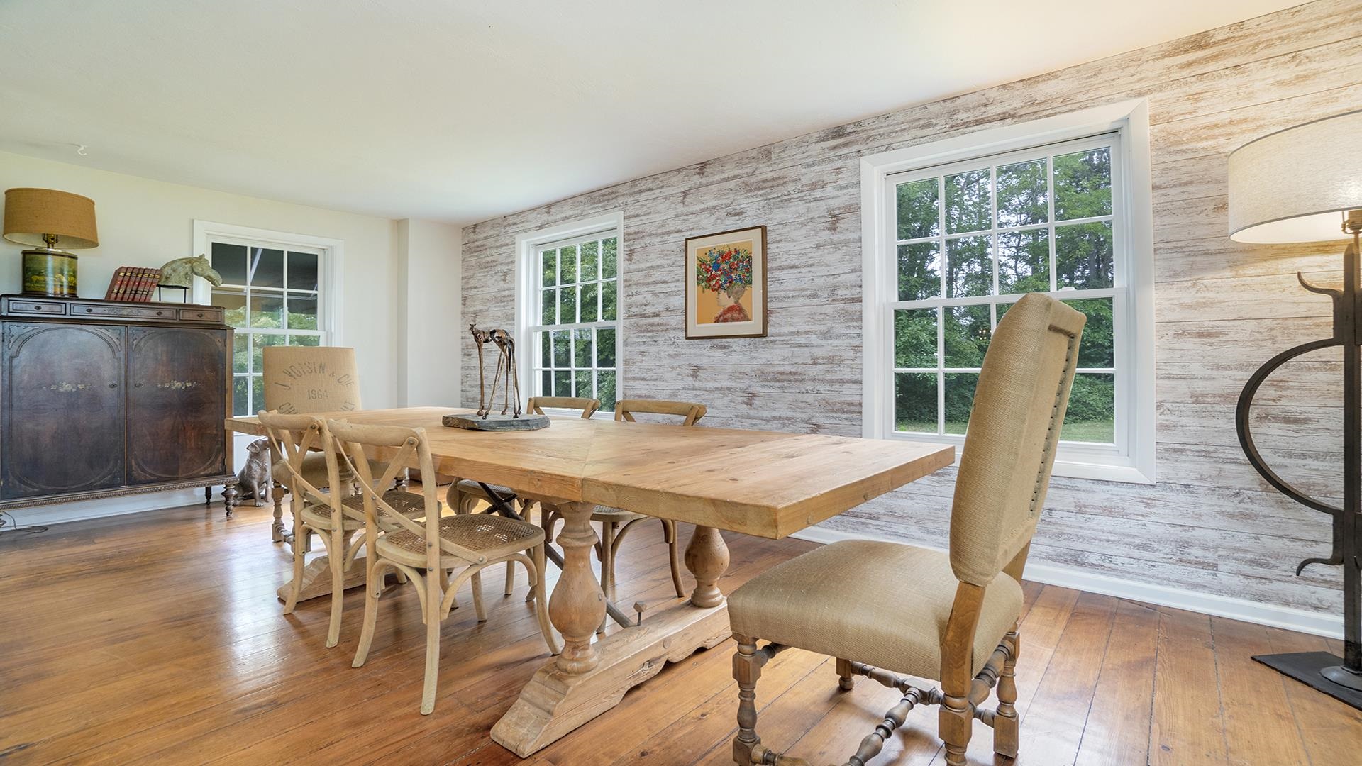 18752 West Edwards Road Antioch, IL 60002 - Photo 46 of 59 a view of a dining room with furniture window and wooden floor