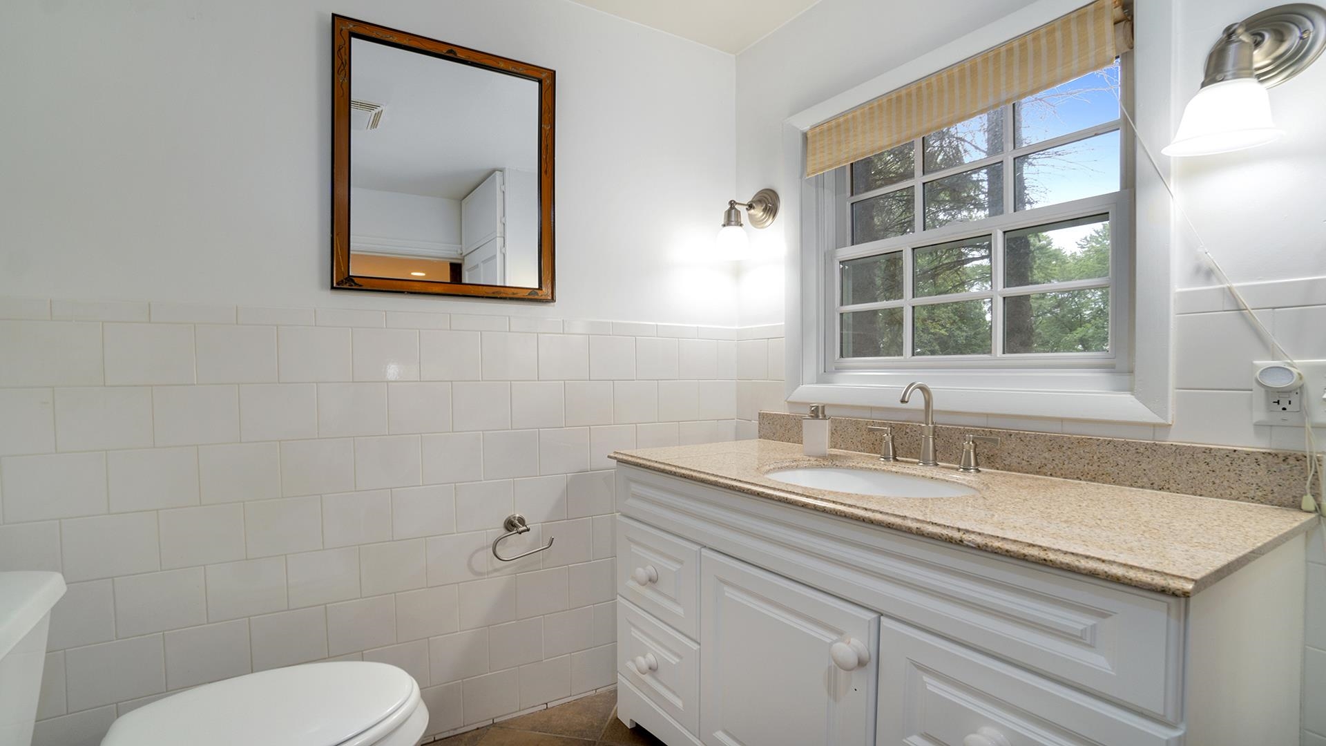 18752 West Edwards Road Antioch, IL 60002 - Photo 50 of 59 a bathroom with a toilet sink and mirror