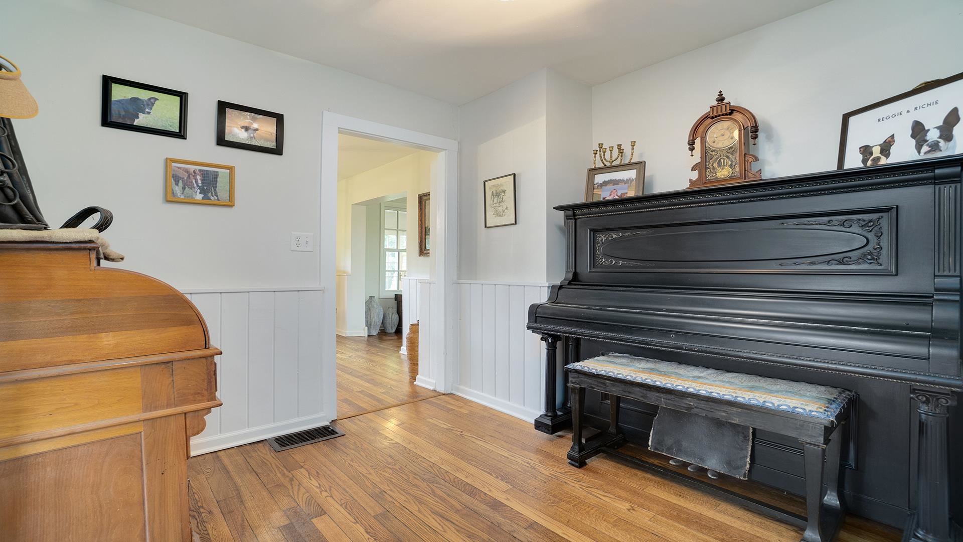 18752 West Edwards Road Antioch, IL 60002 - Photo 54 of 59 a view of a livingroom with wooden floor and a ceiling fan