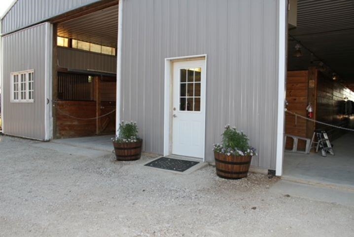 18752 West Edwards Road Antioch, IL 60002 - Photo 10 of 59 a view of a house with a potted plant and a window