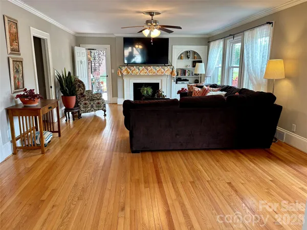 a kitchen with stainless steel appliances a refrigerator sink and microwave