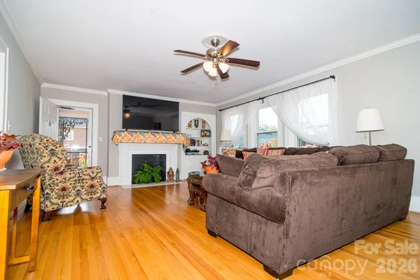 a kitchen with stainless steel appliances granite countertop a stove refrigerator sink and cabinets