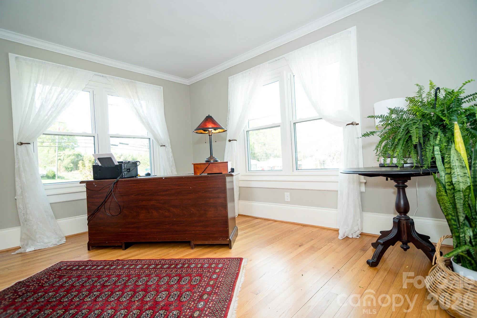 610 East Main Street Cherryville, NC 28021 - Photo 19 of 48 a living room with furniture and a window