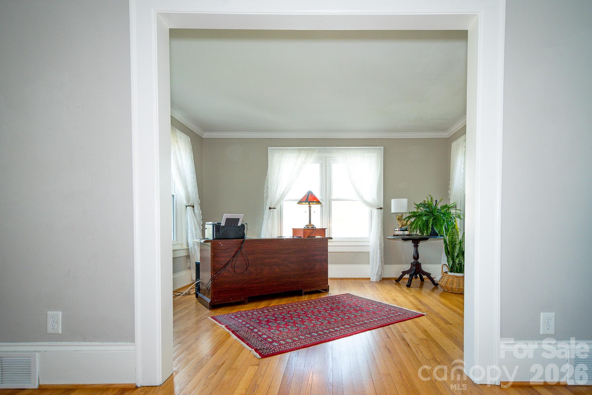 610 East Main Street Cherryville, NC 28021 - Photo 20 of 48 a living room with furniture and a potted plant