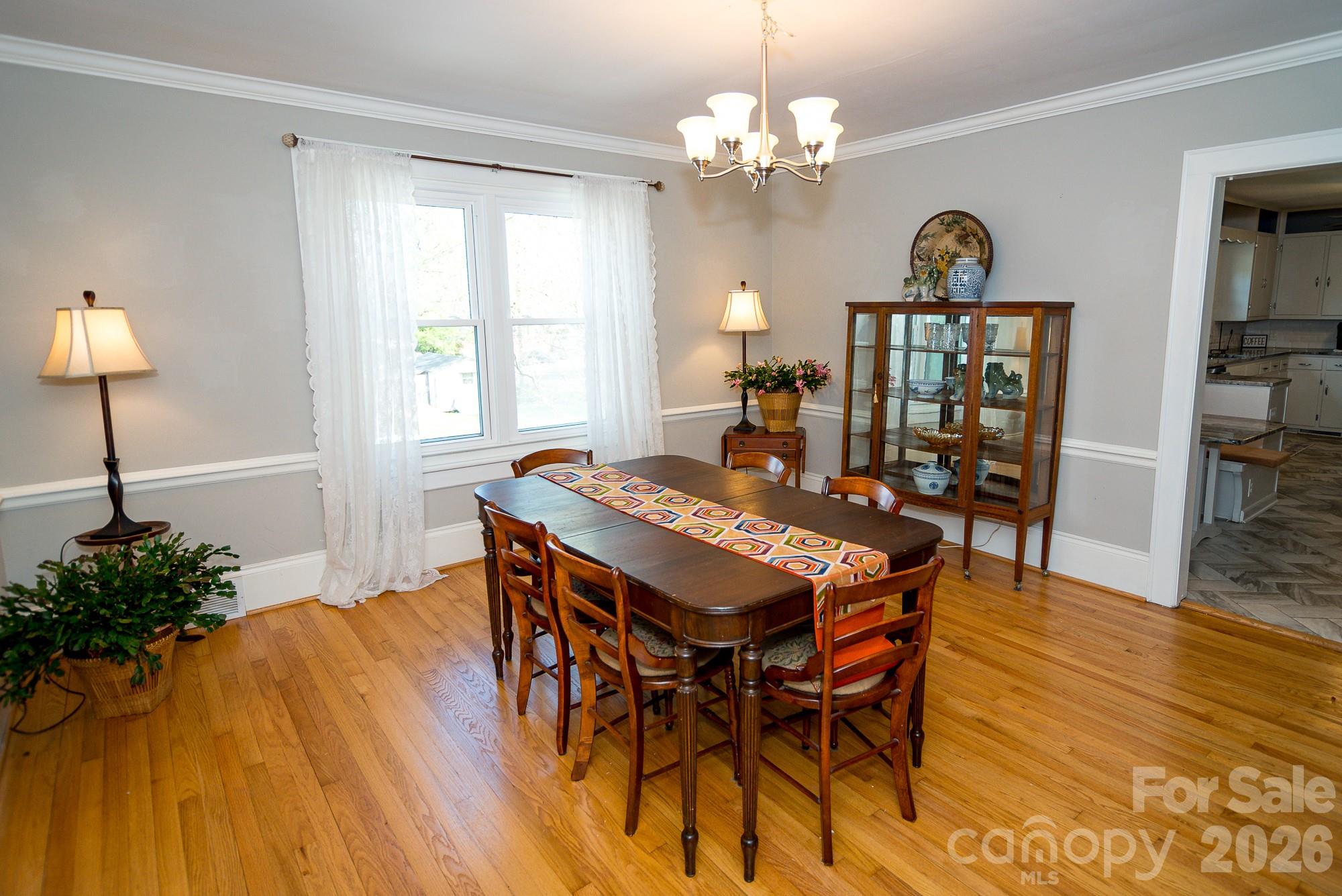 610 East Main Street Cherryville, NC 28021 - Photo 22 of 48 a view of a dining room with furniture and wooden floor