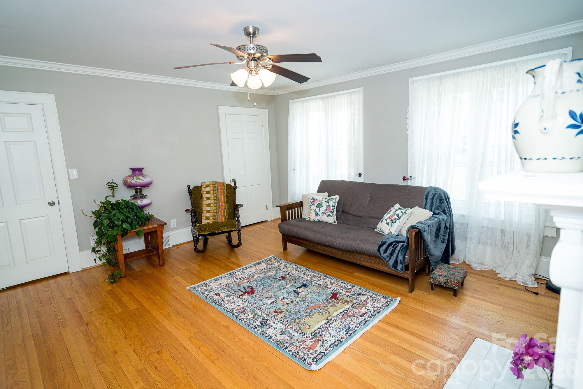 610 East Main Street Cherryville, NC 28021 - Photo 24 of 48 a living room with furniture and wooden floor