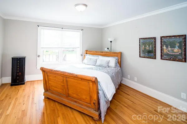 a view of a livingroom with furniture and a window