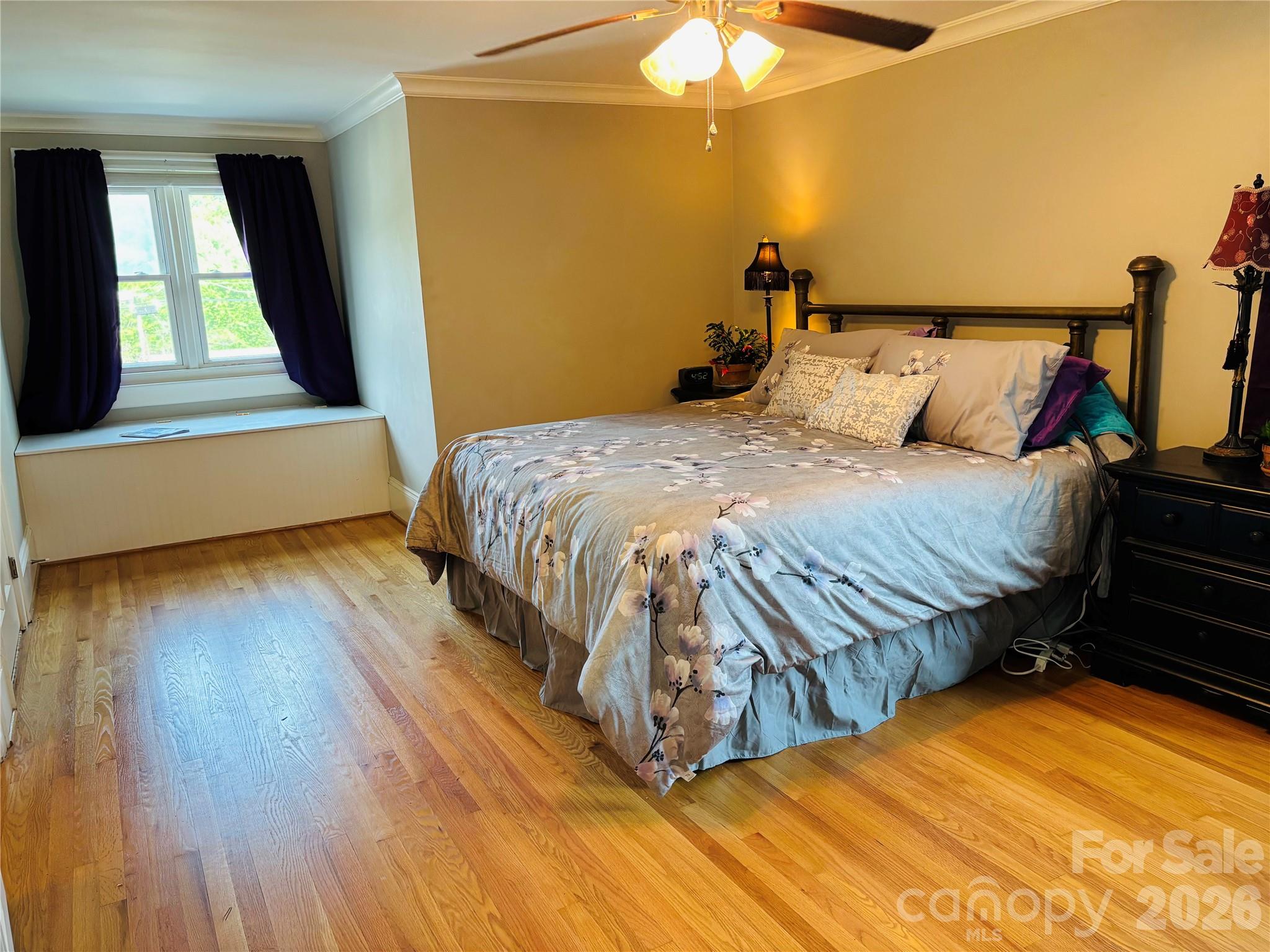 610 East Main Street Cherryville, NC 28021 - Photo 40 of 48 a bedroom with a bed and wooden floor