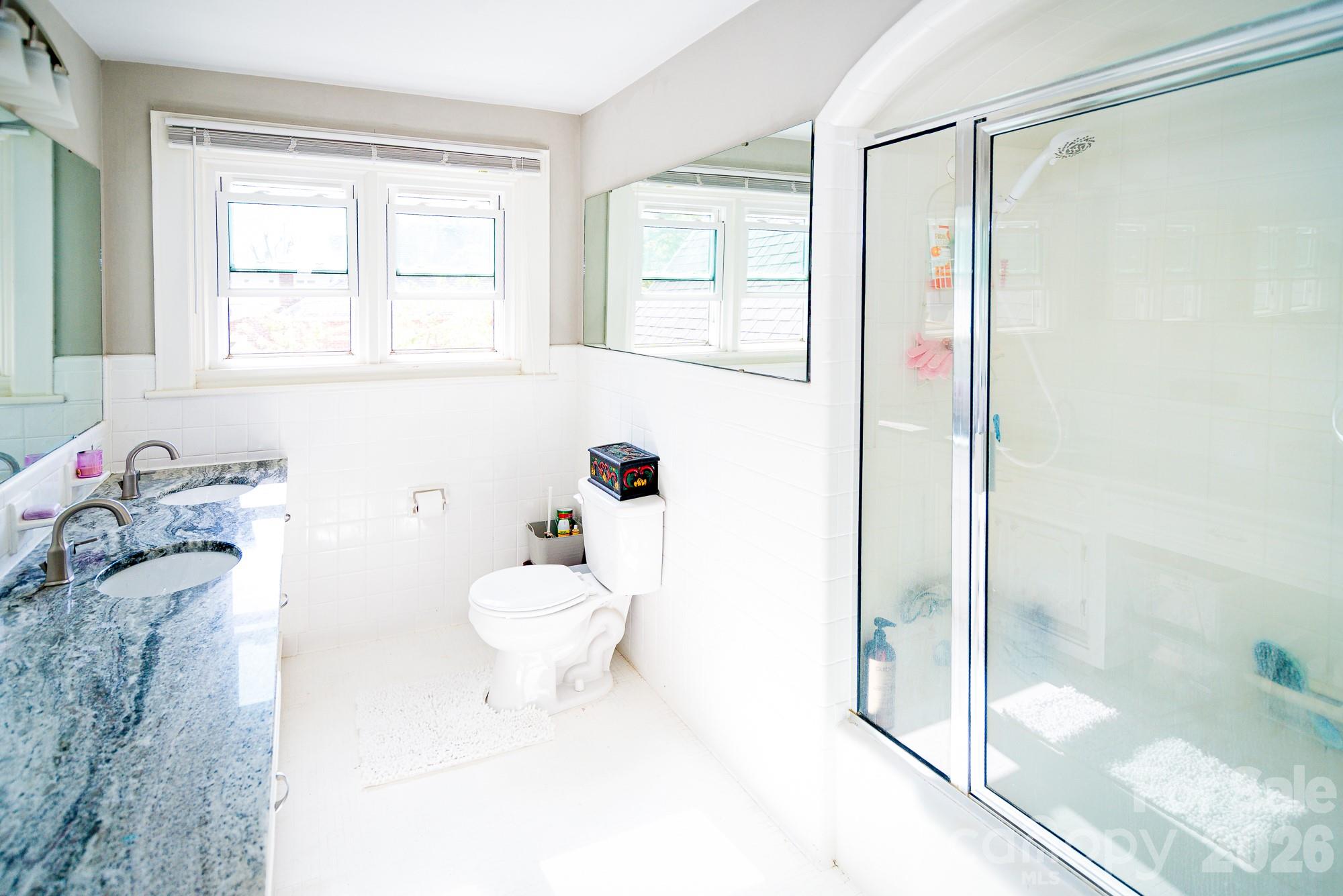 610 East Main Street Cherryville, NC 28021 - Photo 42 of 48 a bathroom with a sink toilet and shower