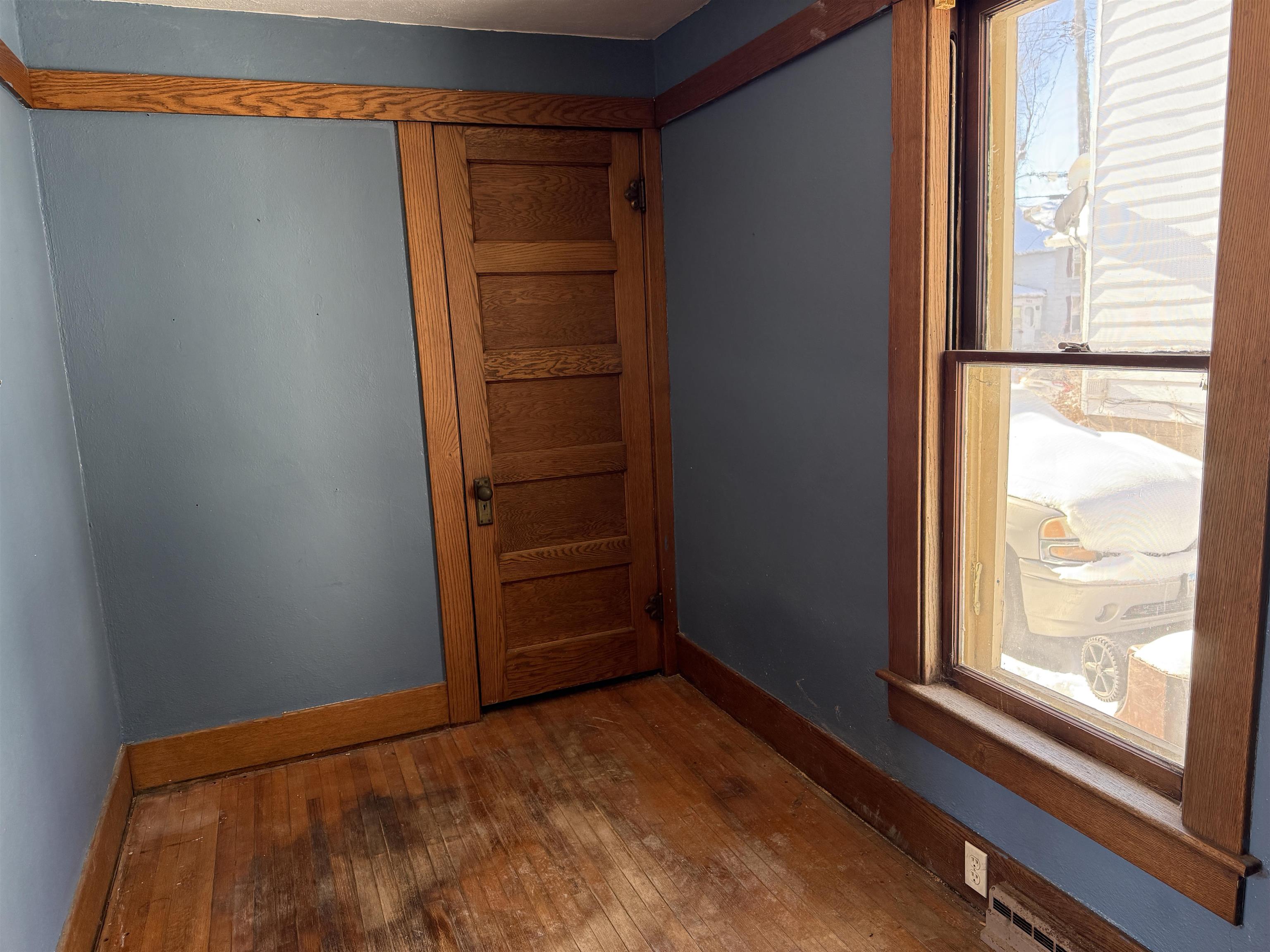 816 West Pleasant Street Freeport, IL 61032 - Photo 4 of 13 a view of empty room with windows