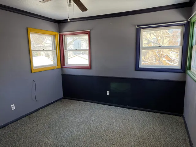 an empty room with windows
