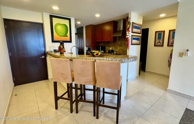 a view of kitchen dining table and chairs