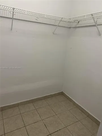 a view of a utility room with dryer and washer