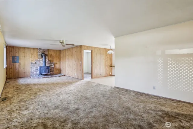 a view of a sink and a refrigerator in a room