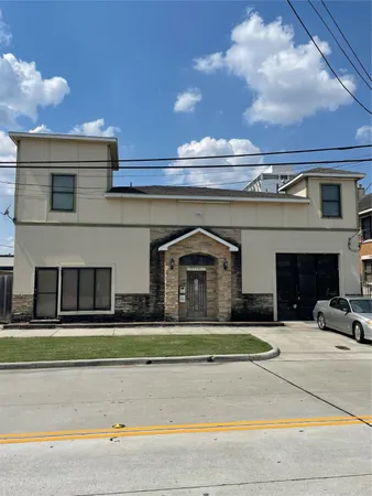 a view of building with yard