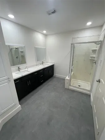a view of room with a sink and mirror