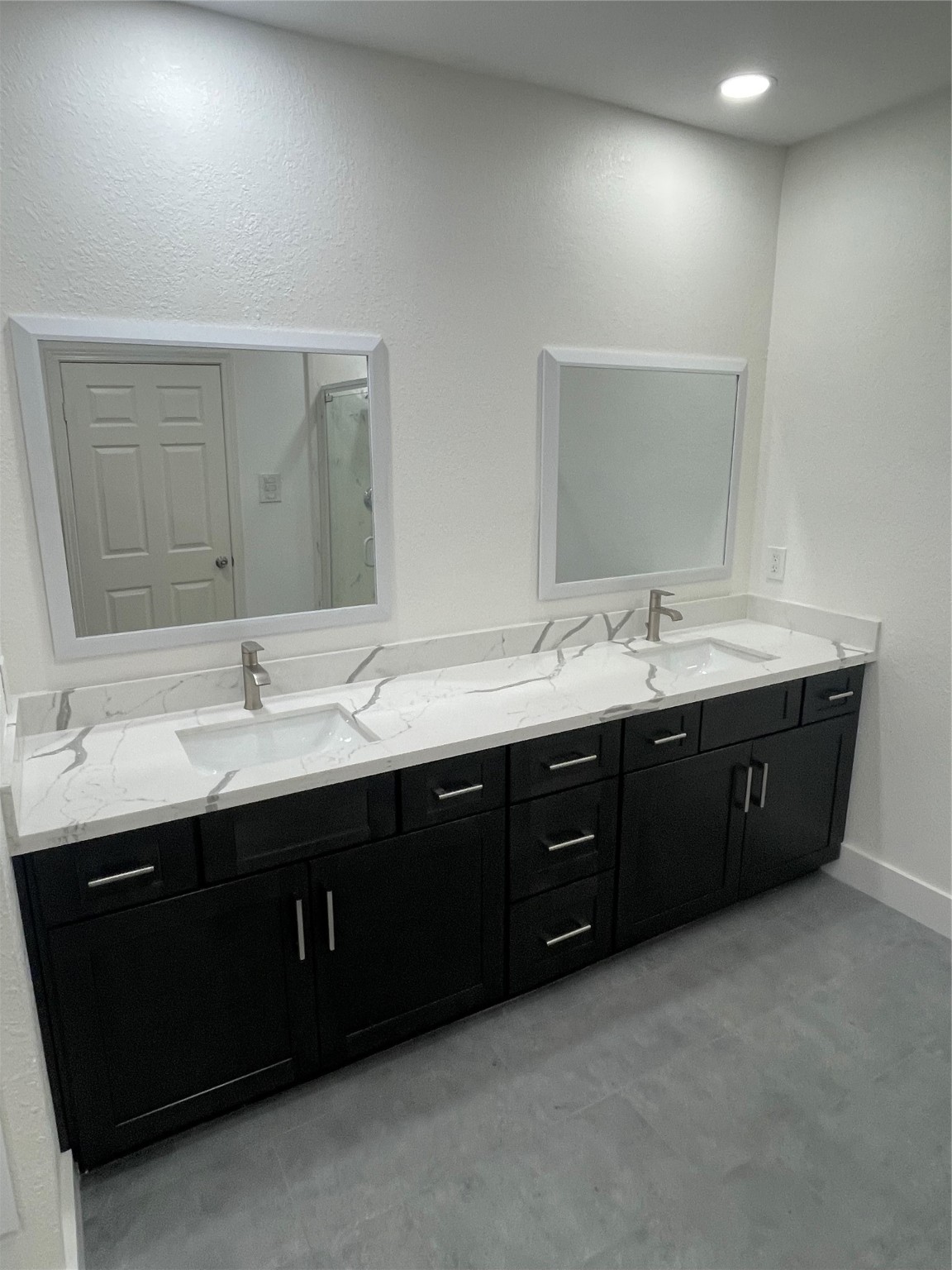 2110 Chenevert Street, Unit 8 Houston, TX 77003 - Photo 10 of 12 a bathroom with a double vanity sink and mirror