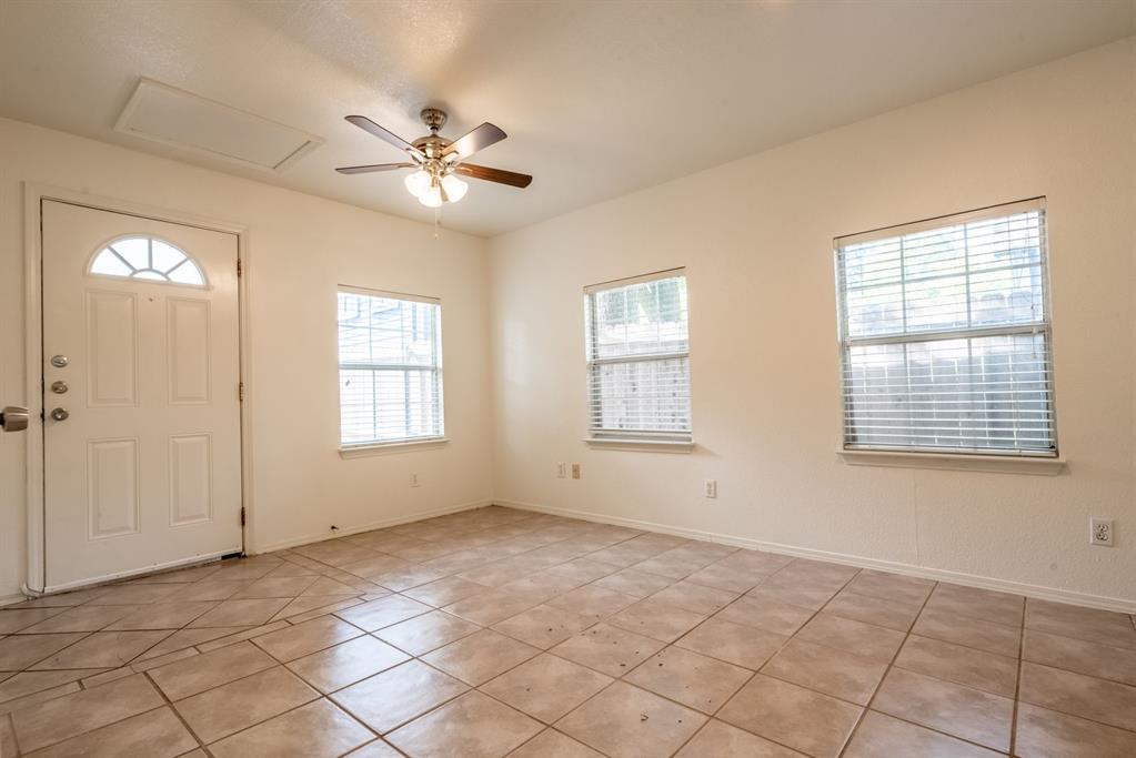 4704 Evans Avenue, Unit B Austin, TX 78751 - Photo 6 of 8 Entrance foyer featuring ceiling fan and light tile patterned floors
