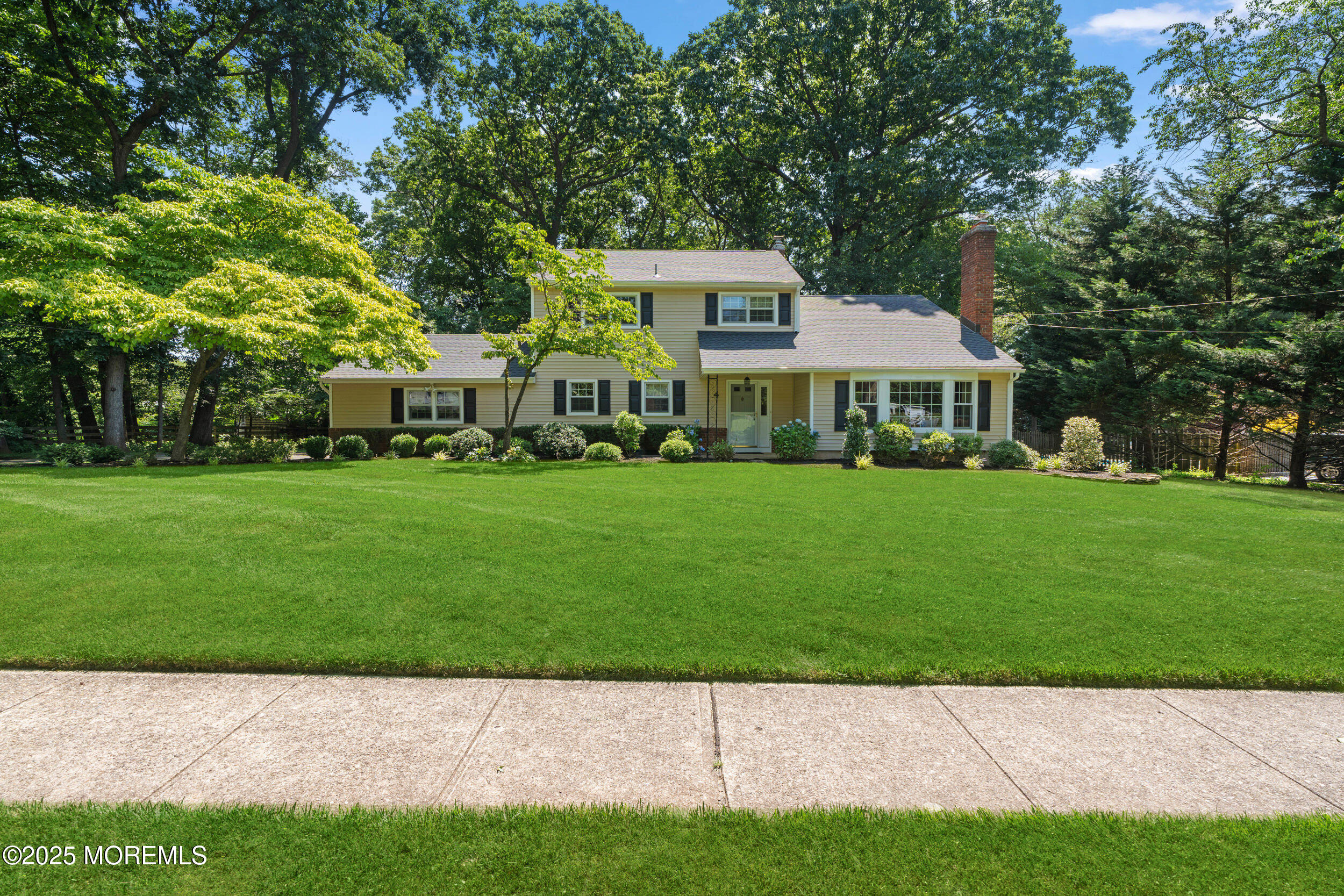a view of house with garden