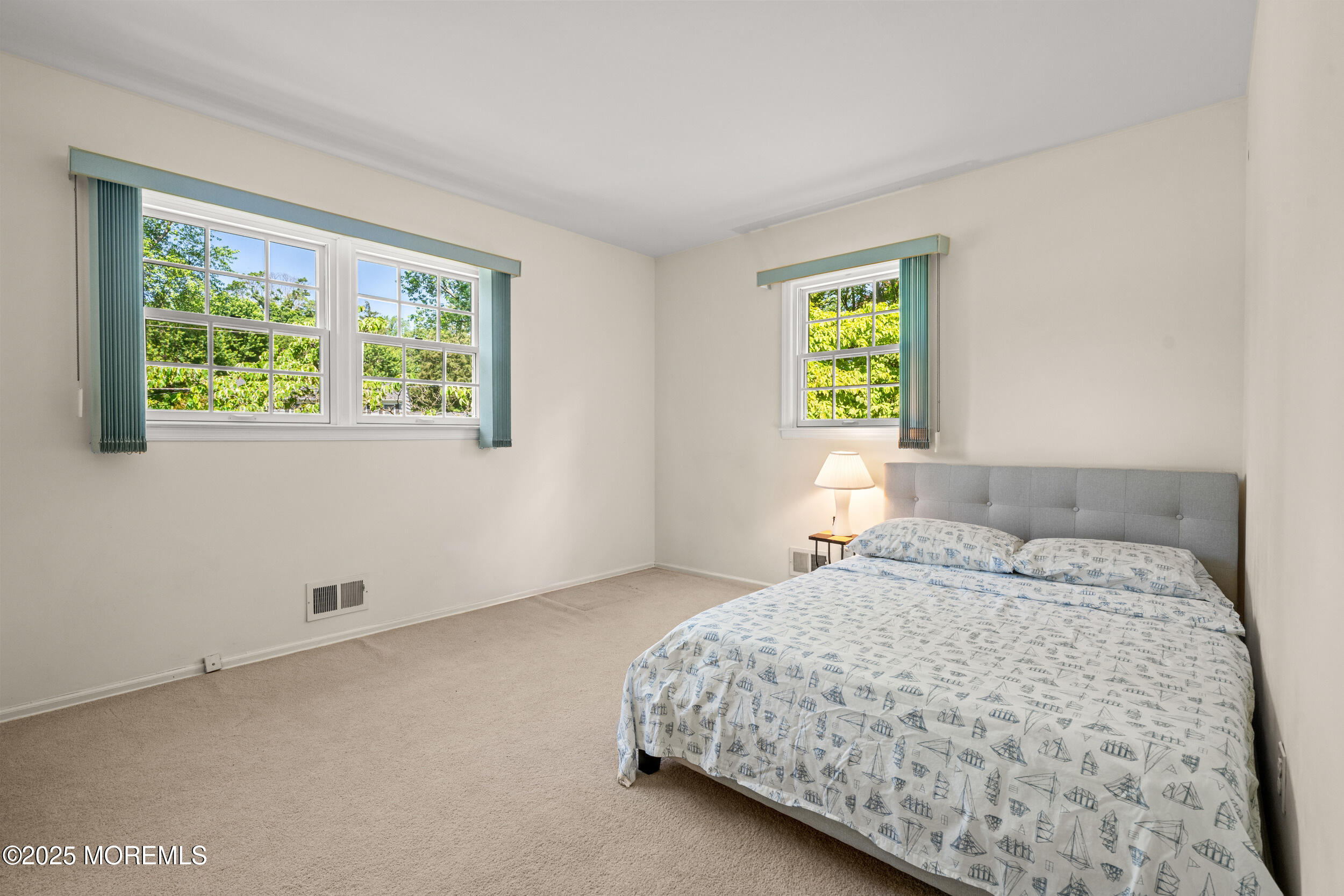 4 Hamilton Hill Road Lincroft, NJ 07738 - Photo 23 of 44 a bedroom with a bed and a window