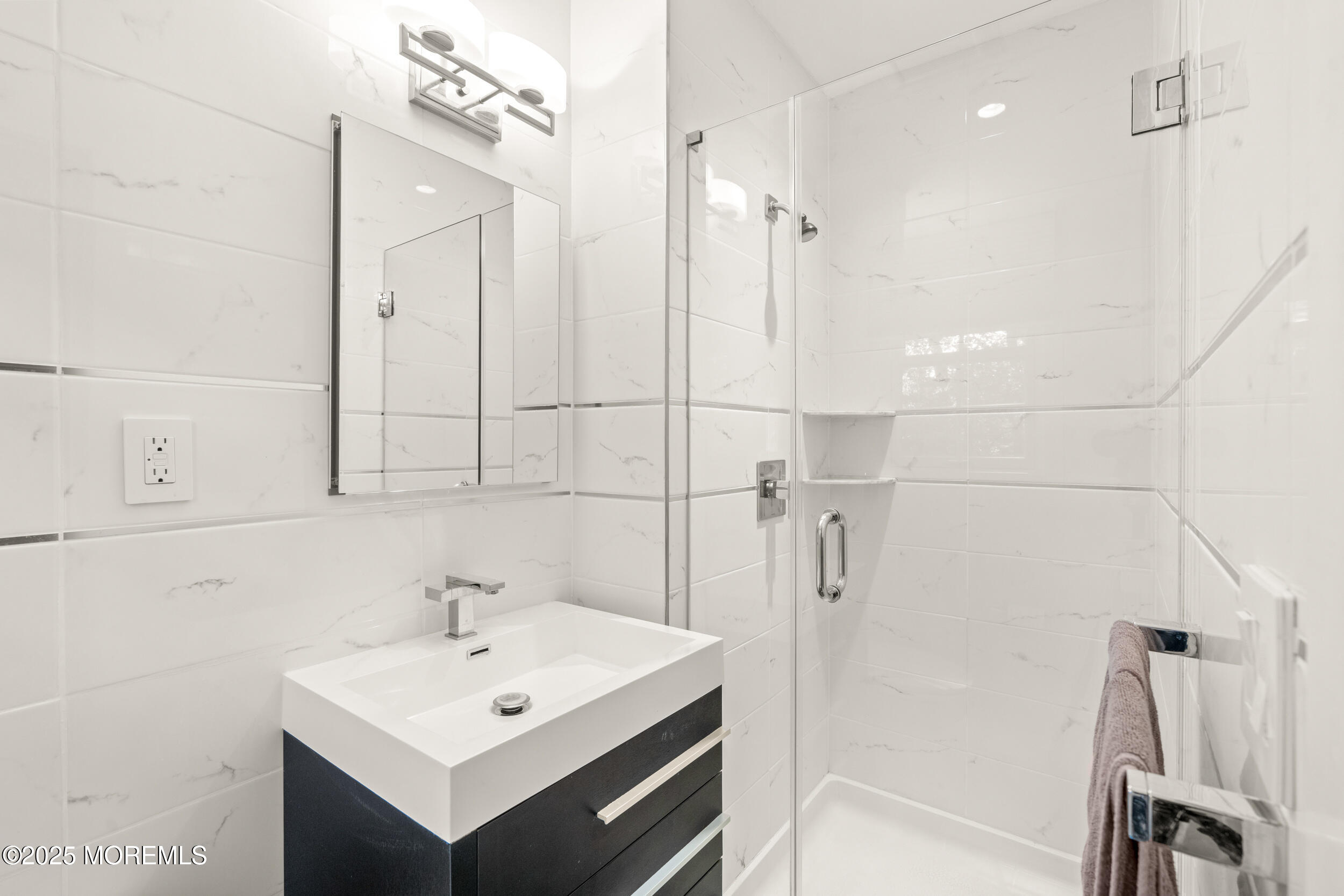 4 Hamilton Hill Road Lincroft, NJ 07738 - Photo 26 of 44 a bathroom with a sink mirror and a shower
