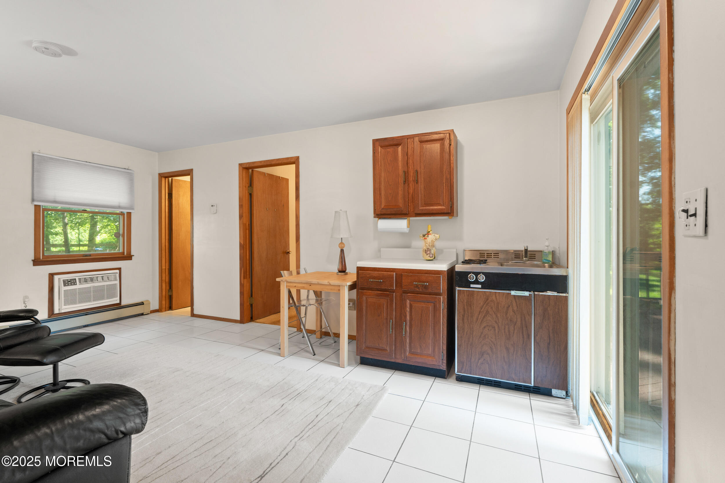 4 Hamilton Hill Road Lincroft, NJ 07738 - Photo 30 of 44 a view of a kitchen with furniture and windows