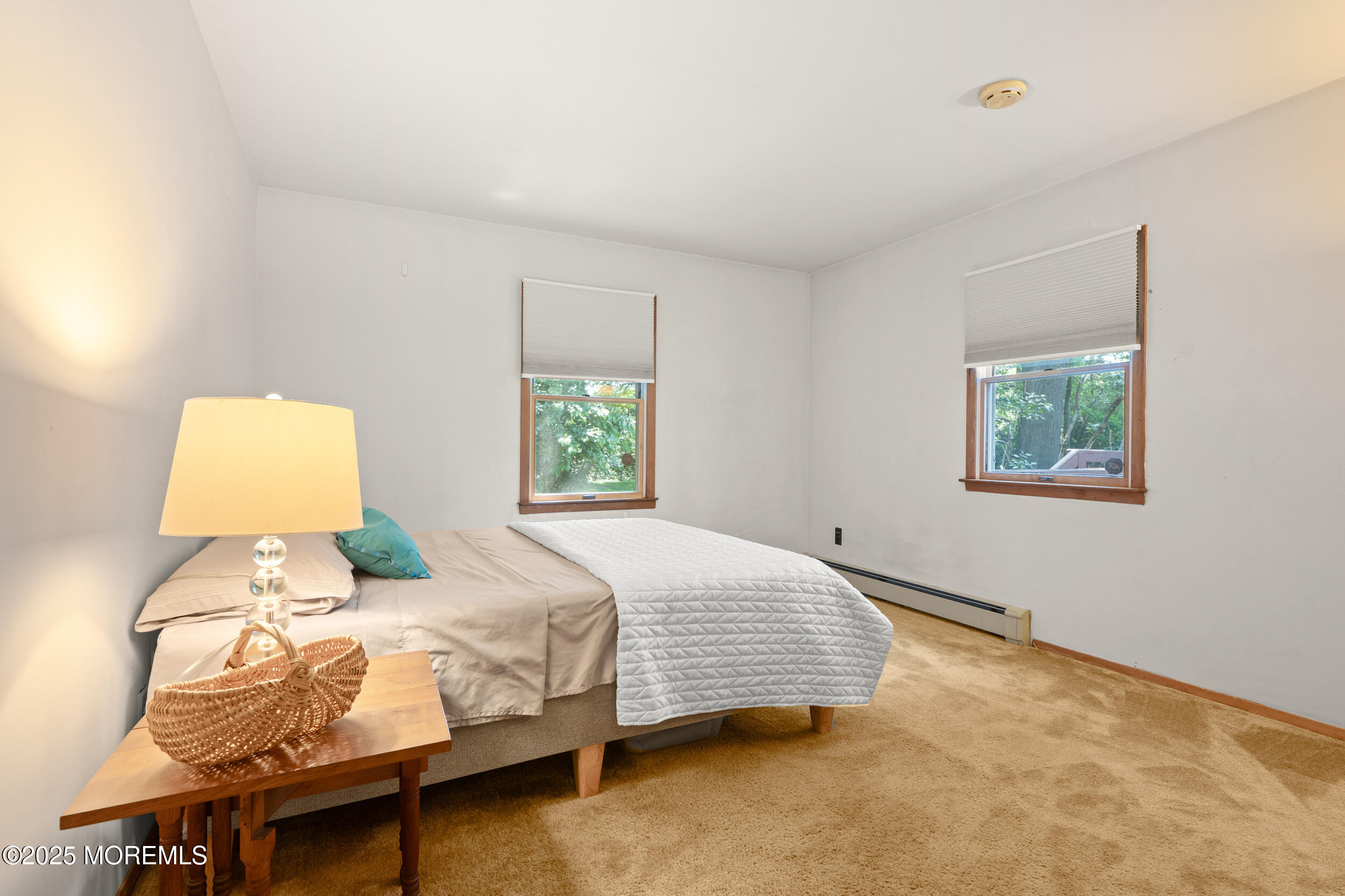 4 Hamilton Hill Road Lincroft, NJ 07738 - Photo 33 of 44 a bedroom with a bed lamp and a window