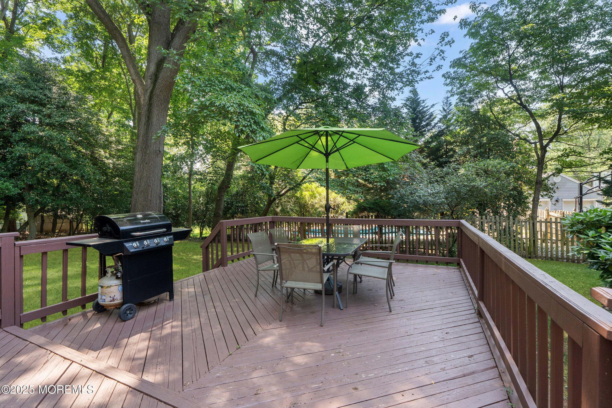 4 Hamilton Hill Road Lincroft, NJ 07738 - Photo 35 of 44 a view of a deck with furniture