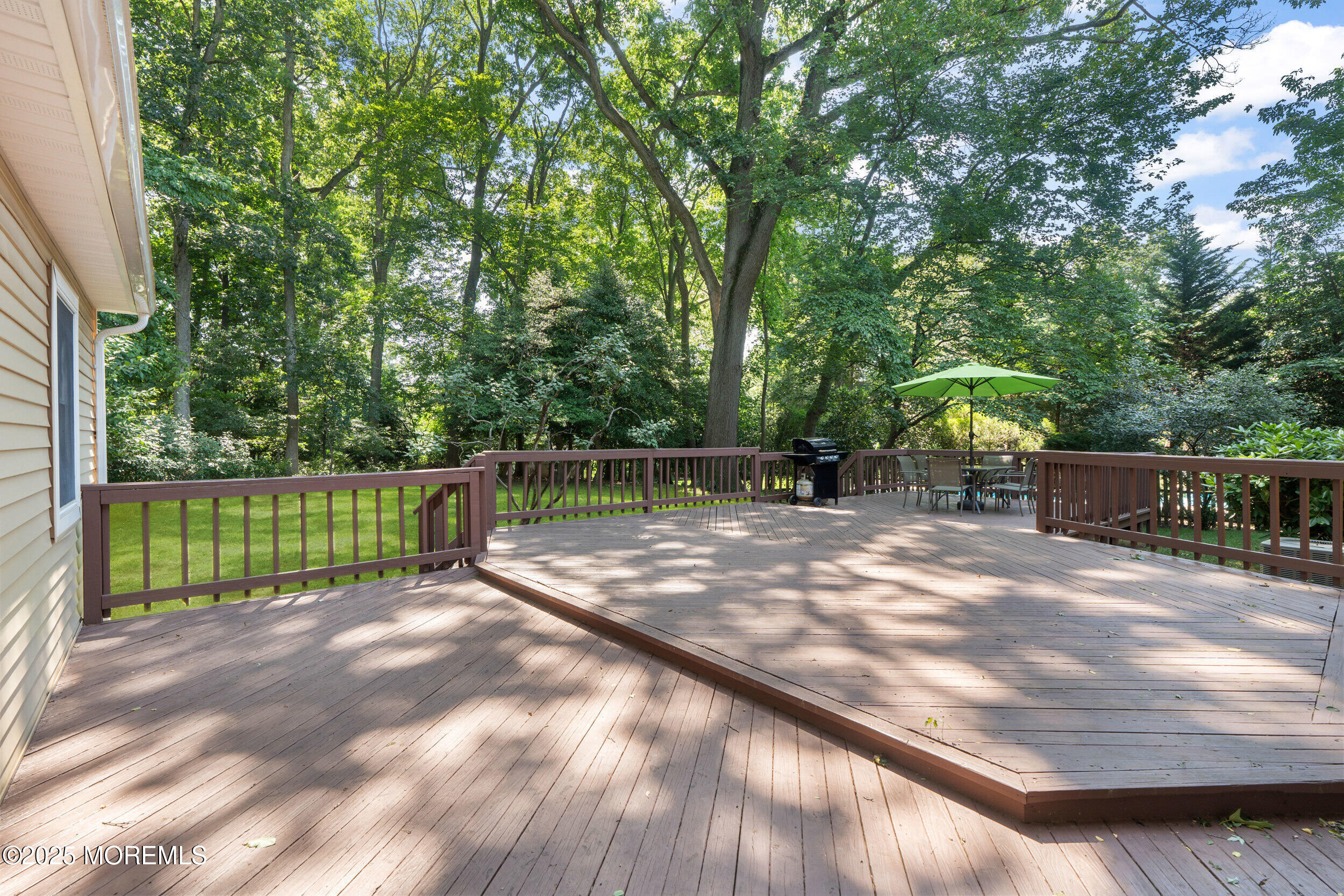 4 Hamilton Hill Road Lincroft, NJ 07738 - Photo 39 of 44 a view of a backyard