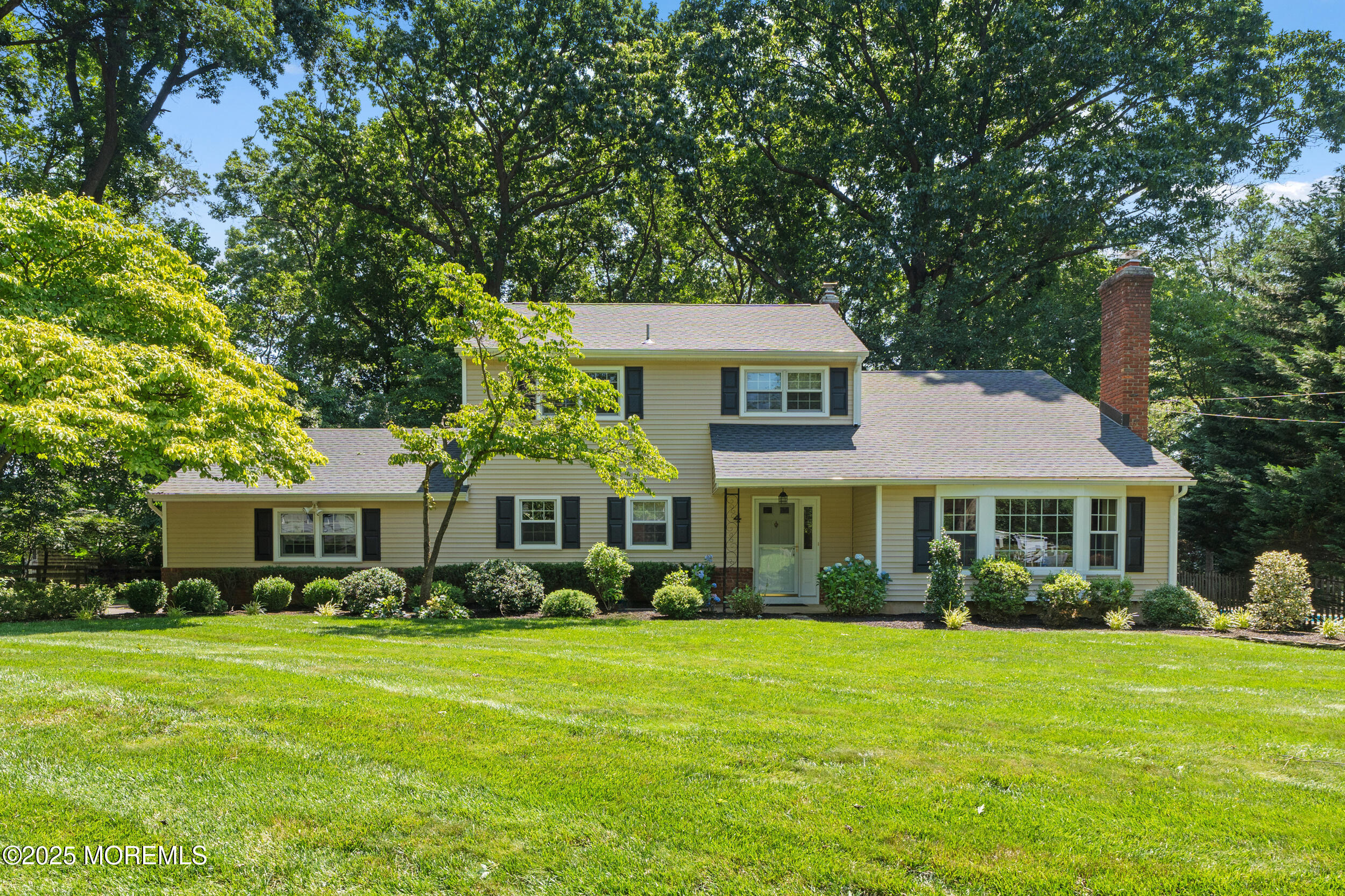 4 Hamilton Hill Road Lincroft, NJ 07738 - Photo 44 of 44 a front view of a house with a garden