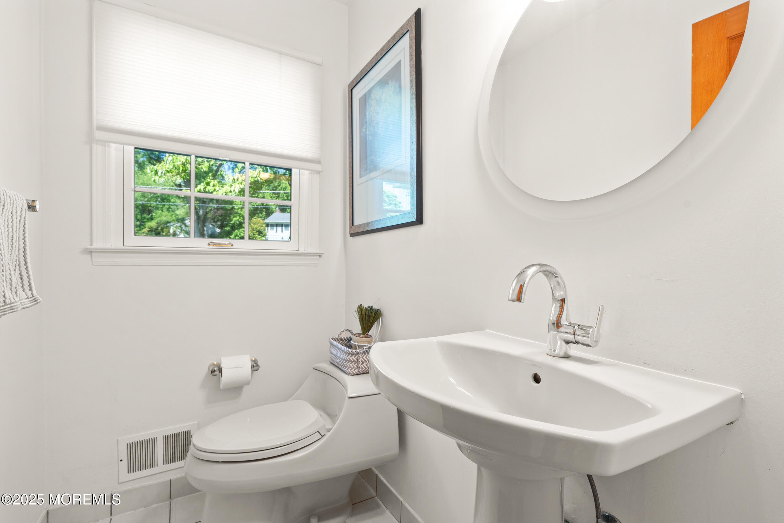 4 Hamilton Hill Road Lincroft, NJ 07738 - Photo 7 of 44 a bathroom with a sink a mirror and a toilet