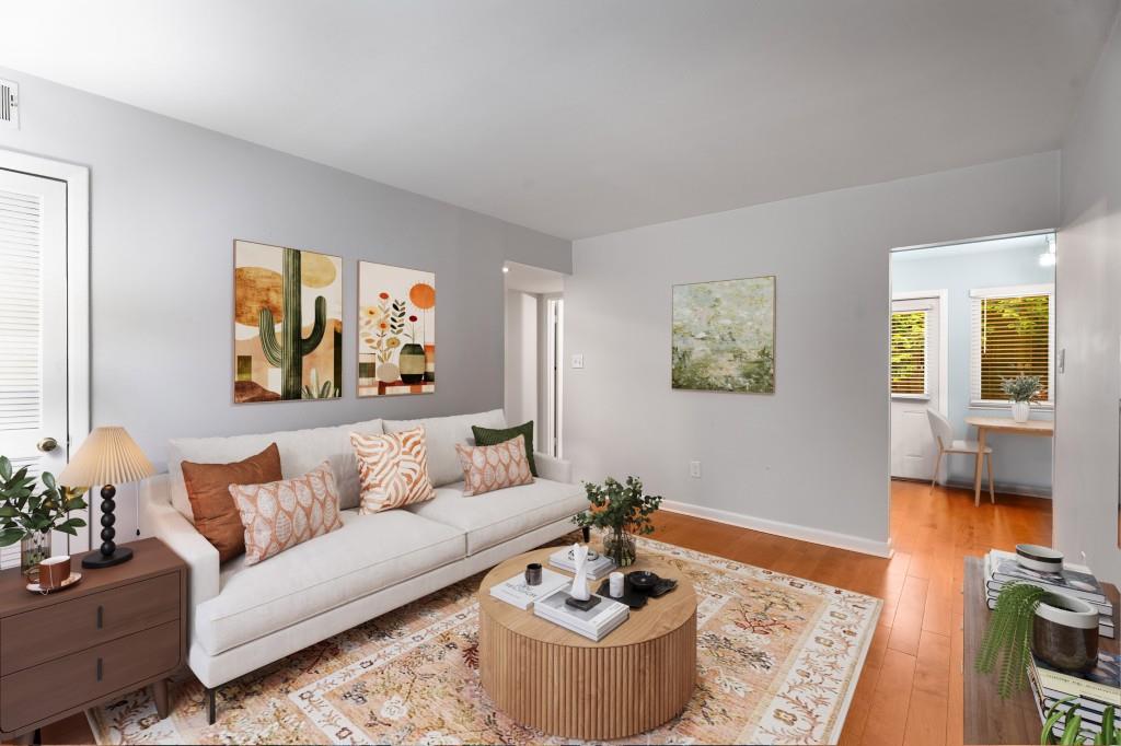 a living room with furniture and a couch