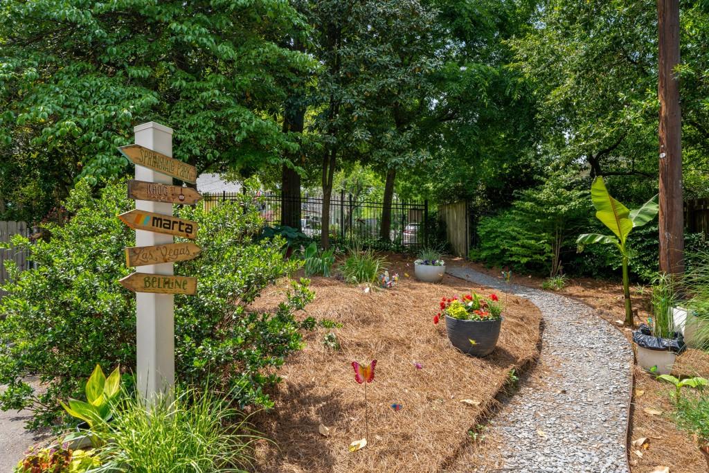 148 Waverly Way Northeast, Unit 6 Atlanta, GA 30307 - Photo 19 of 32 a view of a backyard of the house