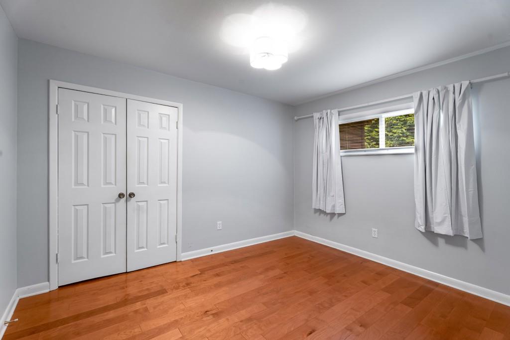 148 Waverly Way Northeast, Unit 6 Atlanta, GA 30307 - Photo 6 of 32 an empty room with windows