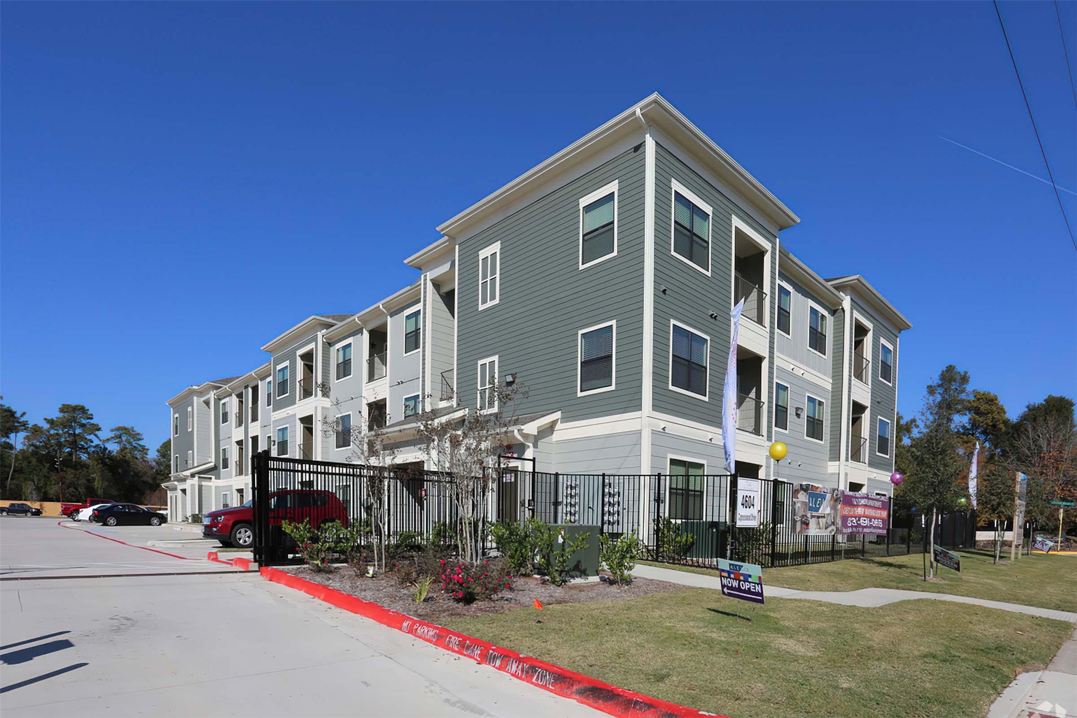 4604 Cypresswood Drive, Unit 3101 Spring, TX 77379 - Photo 21 of 29 a front view of a building with street