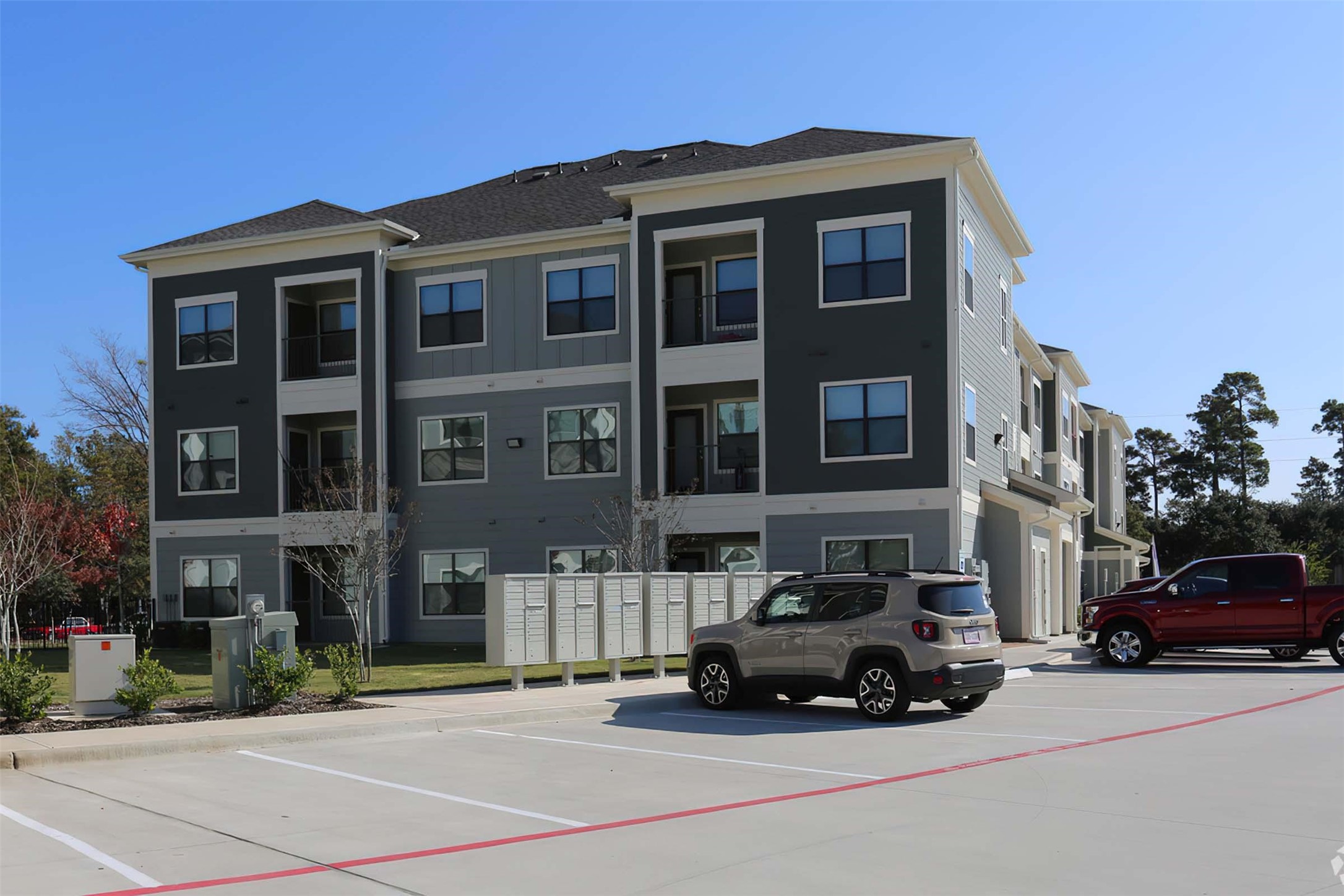 4604 Cypresswood Drive, Unit 3101 Spring, TX 77379 - Photo 26 of 29 a car parked in front of a building