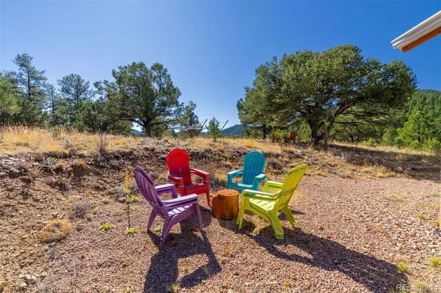 a view of a bench in a backyard