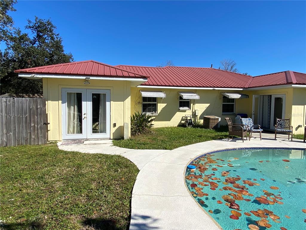 910 Lake Avenue Edgewater, FL 32132 - Photo 19 of 23 a view of a house with patio
