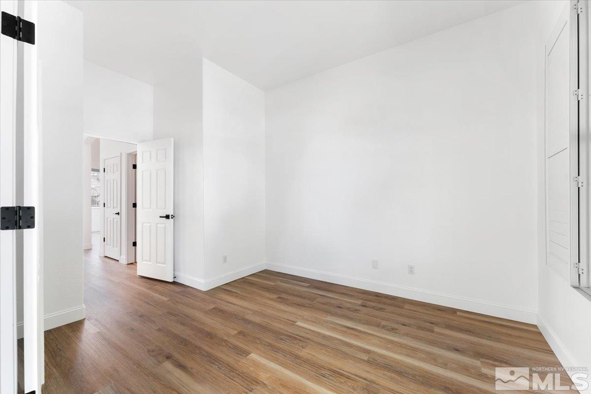 1730 Hunter Creek Road Reno, NV 89519 - Photo 22 of 39 a view of a room with wooden floor