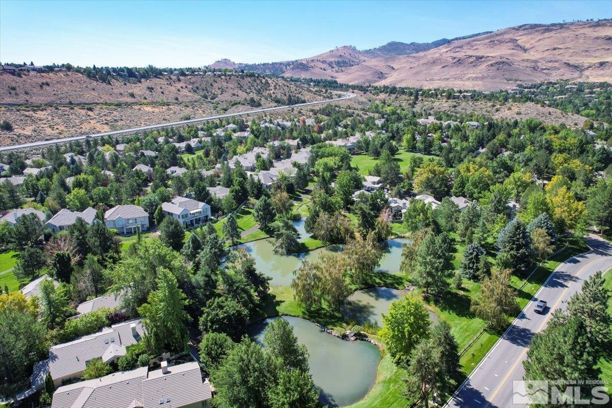 1730 Hunter Creek Road Reno, NV 89519 - Photo 33 of 39 an aerial view of a houses with outdoor space and mountain view in back