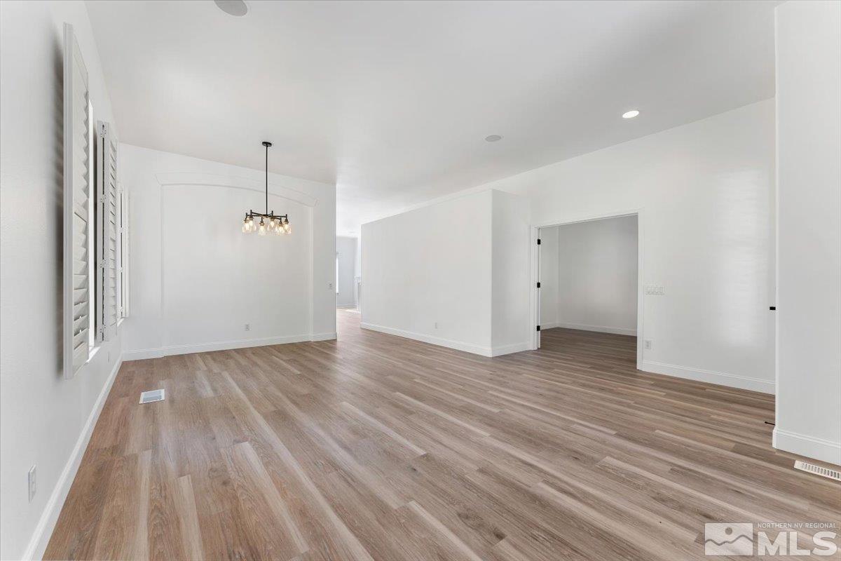 1730 Hunter Creek Road Reno, NV 89519 - Photo 6 of 39 a view of empty room with wooden floor