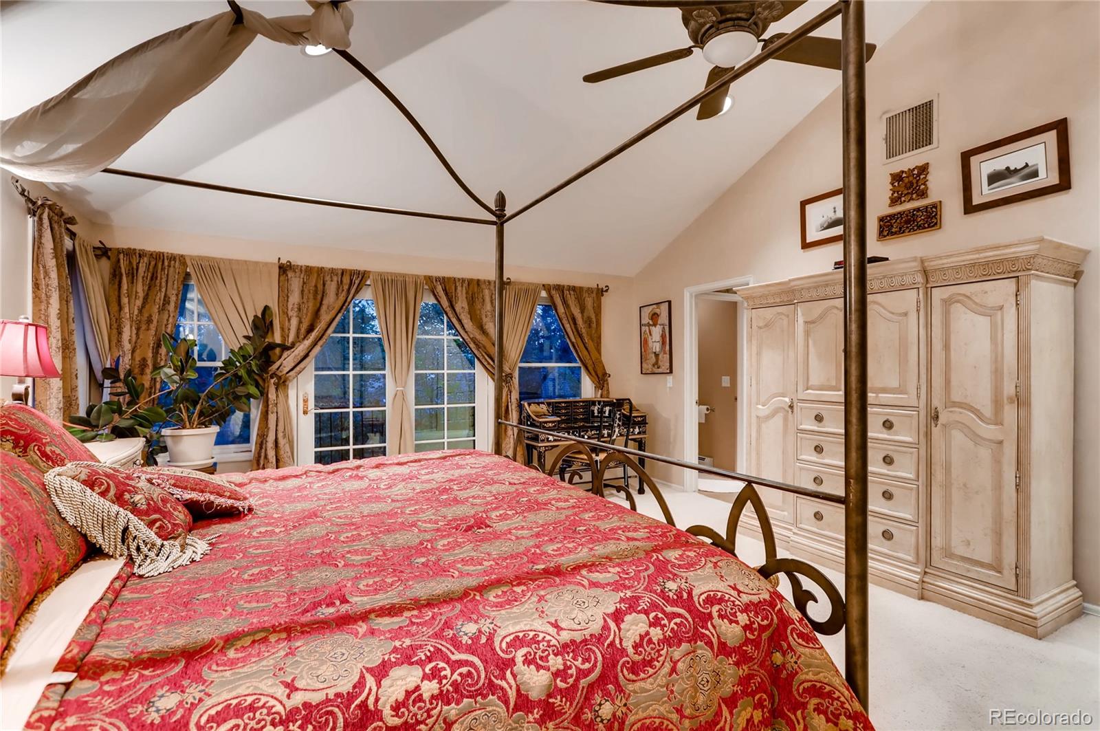 626 Fillmore Street Denver, CO 80206 - Photo 17 of 31 a bed sitting in a bedroom next to a window