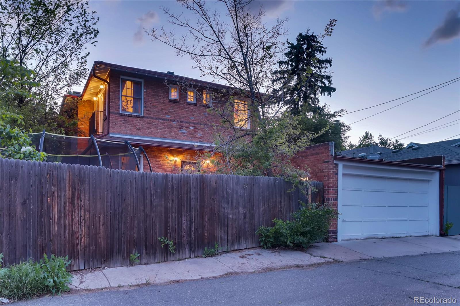 626 Fillmore Street Denver, CO 80206 - Photo 28 of 31 a view of a house with a garage