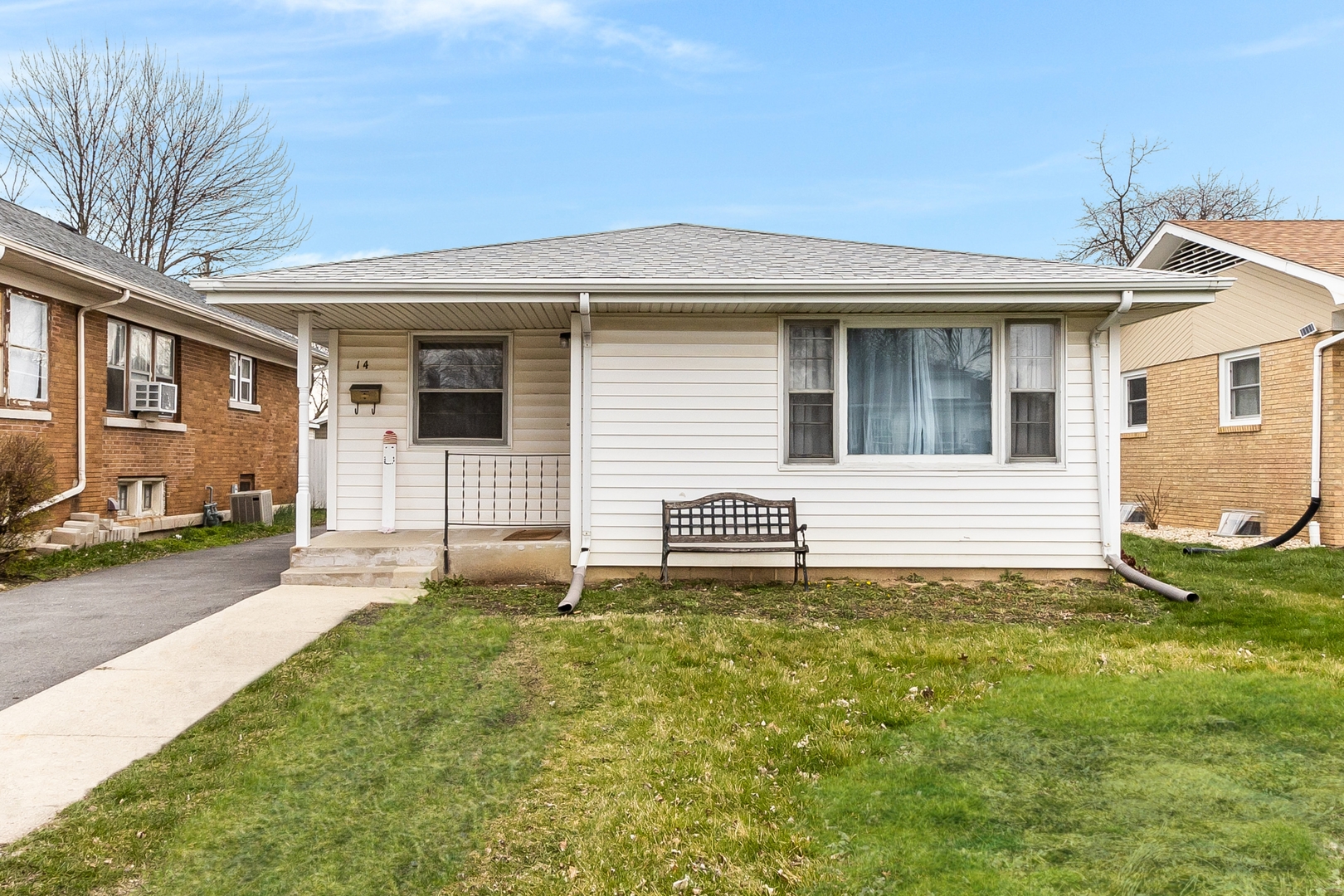 14 South Reed Street Joliet, IL 60436 - Photo 1 of 15 a house that has a window in front of it