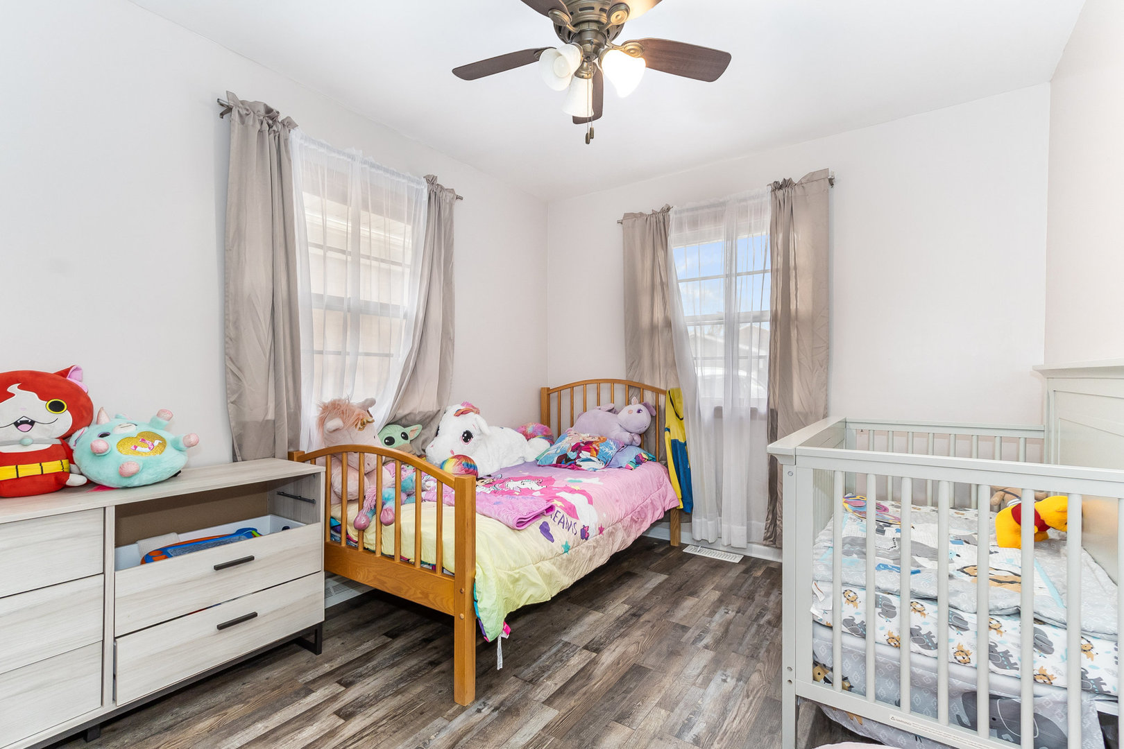 14 South Reed Street Joliet, IL 60436 - Photo 7 of 15 a bedroom with bed and a window