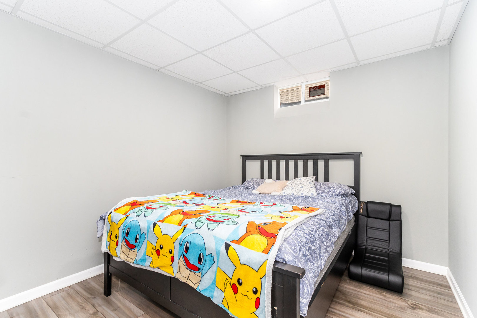 14 South Reed Street Joliet, IL 60436 - Photo 10 of 15 a bedroom with a bed and a table