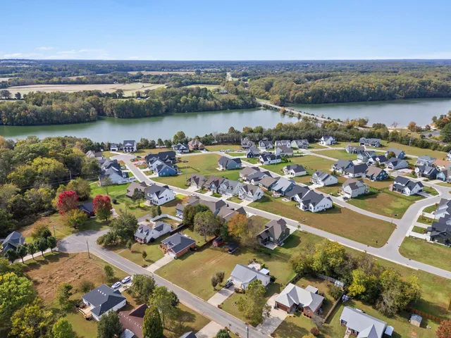 a living room with furniture window and wooden floor