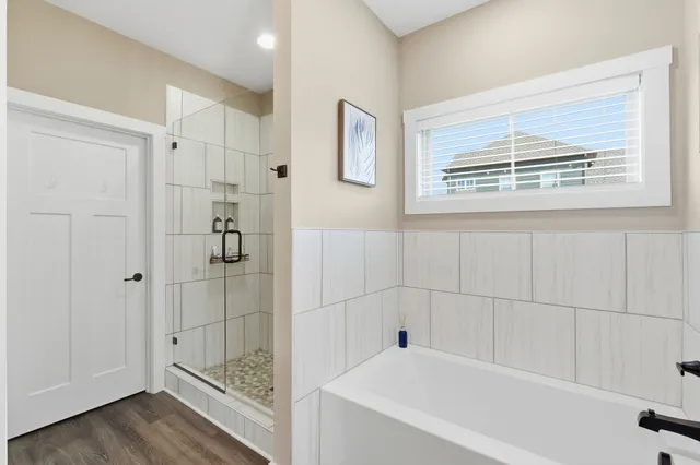 a patio with yard glass top table and chairs