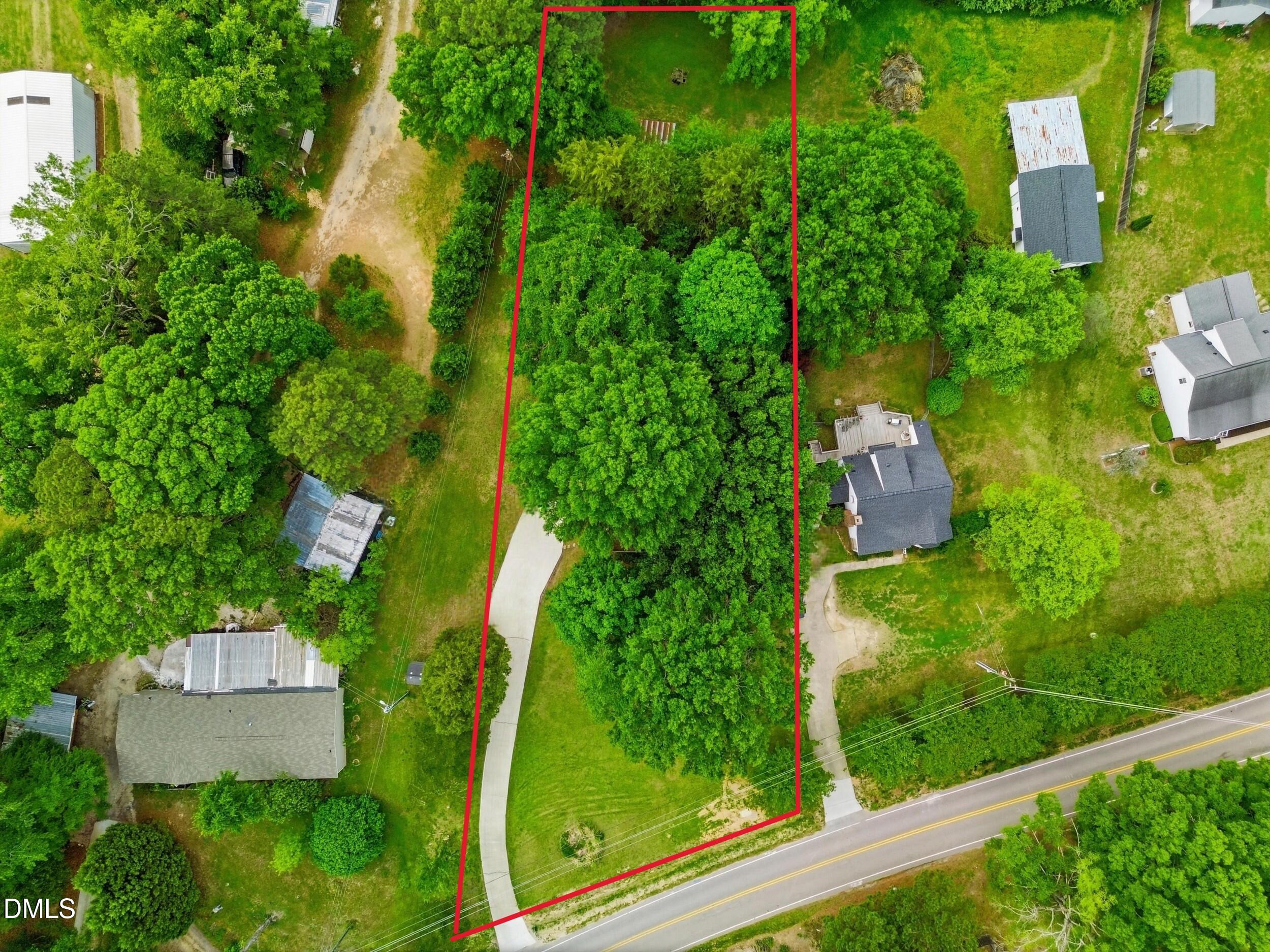 517 Lake Glad Road Wendell, NC 27591 - Photo 31 of 36 an aerial view of residential house with outdoor space and trees all around