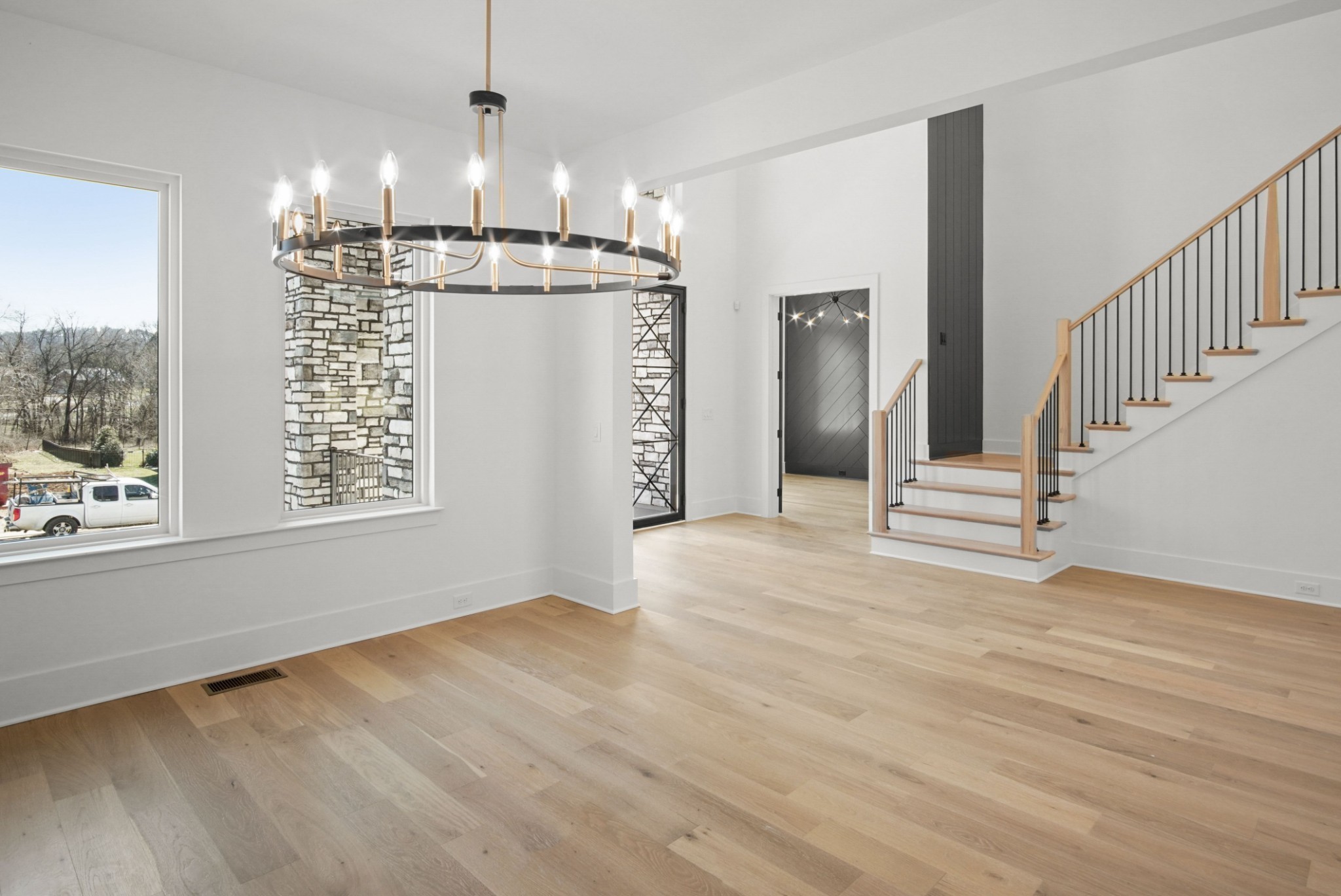 6029 Lookaway Circle Franklin, TN 37067 - Photo 11 of 64 a view of a room with wooden floor and staircase
